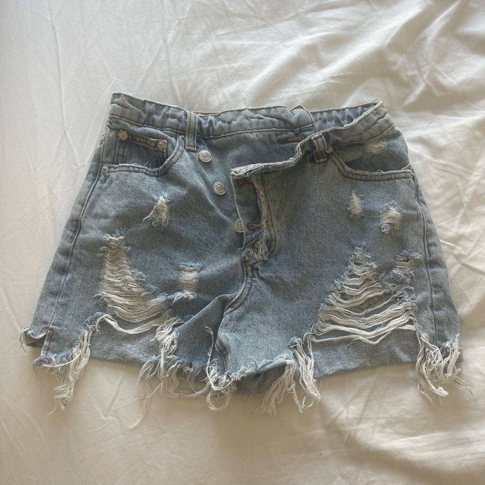 Denim asymmetrical band distressed shorts size Small